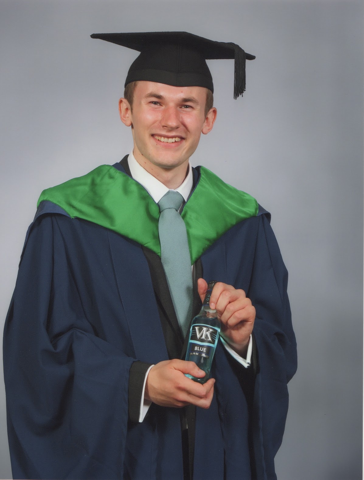 Handsome young man at his graduation ceremony.